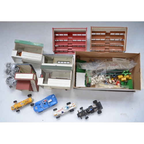 123 - Collection of Scalextric track, controllers, 6 cars, scenic accessories, buildings etc and a quantit... 