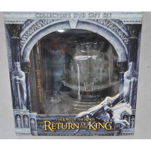 150 - Three boxed Lord Of The Rings sets to include 2 Towers Gollum figurine, Return of the King talking G... 