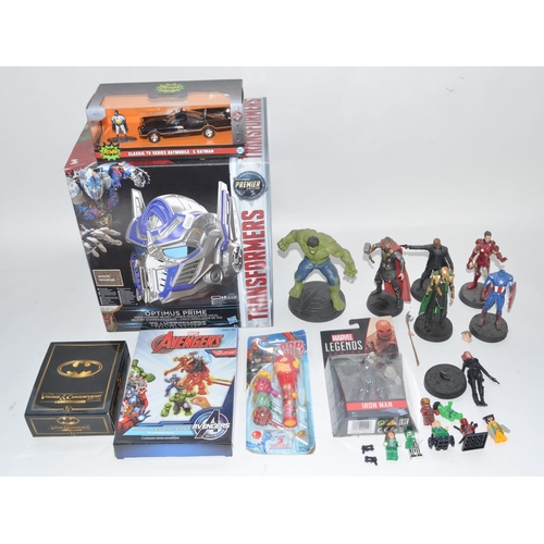 152A - Collection of Super hero models incl. boxed and sealed Optimus Prime voice changing helmet, 7 resin ... 