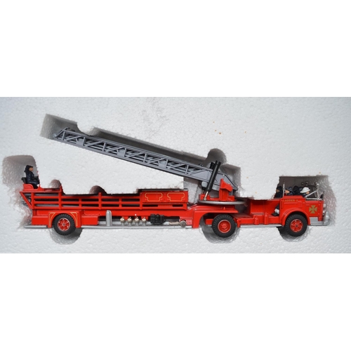 184 - Collection of diecast model buses, trucks and fire engines, various manufacturers and scales to incl... 