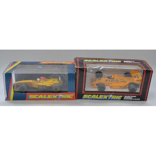 194 - Collection of slot cars for Scalextric to include 5 boxed models (a Carrera Ferrari F14 T Raikkonen,... 