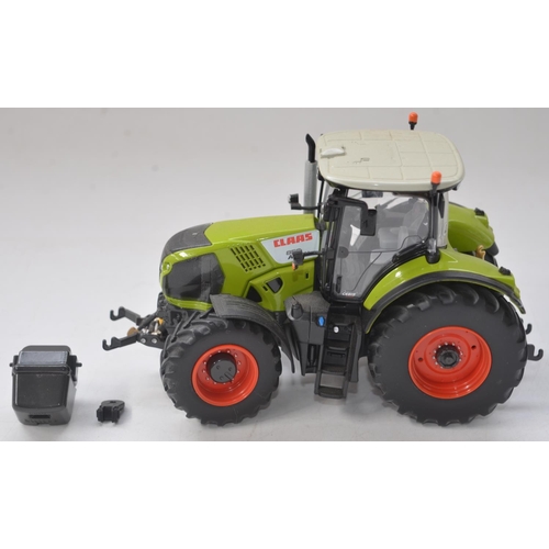 197 - Six 1/32 diecast farm machinery models to include Universal Hobbies Claas Atles 936RZ, Massey Fergus... 