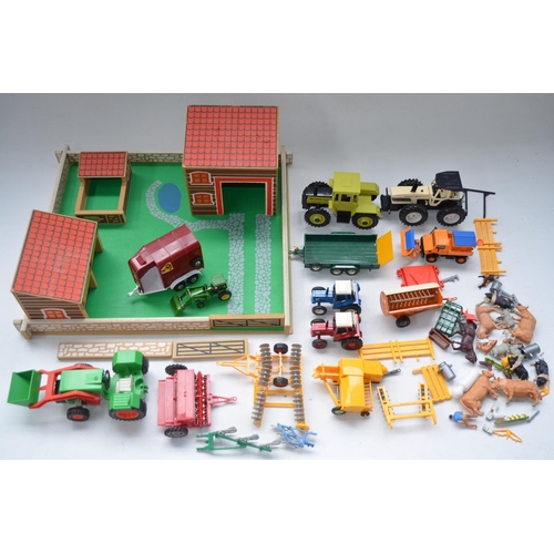 200 - Collection of farm toys to include farmyard layout, farm machinery and tractors, mostly Britains, an... 