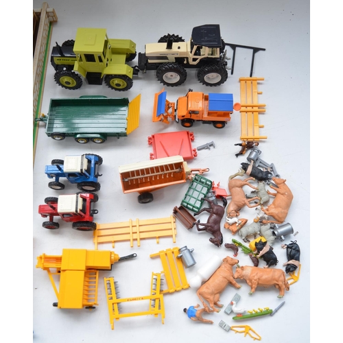 200 - Collection of farm toys to include farmyard layout, farm machinery and tractors, mostly Britains, an... 