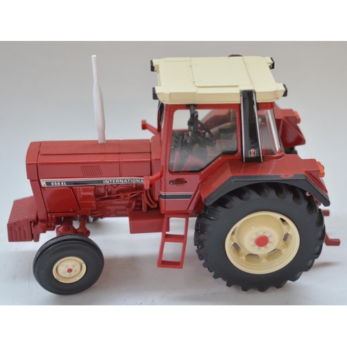 196A - Seven boxed Britain's tractor models to include 42416 Ford 7600, 42895 New Holland T6.175, 42887 New... 