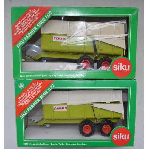 198 - Eleven boxed 1/32 diecast farm machinery models by Siku to include 6 tractors (4x Claas, 1x Valtra, ... 