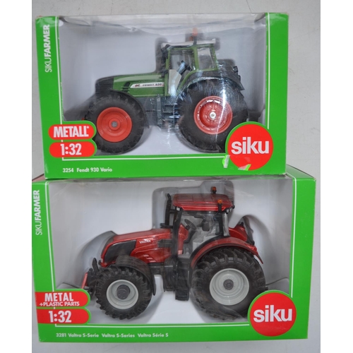 198 - Eleven boxed 1/32 diecast farm machinery models by Siku to include 6 tractors (4x Claas, 1x Valtra, ... 