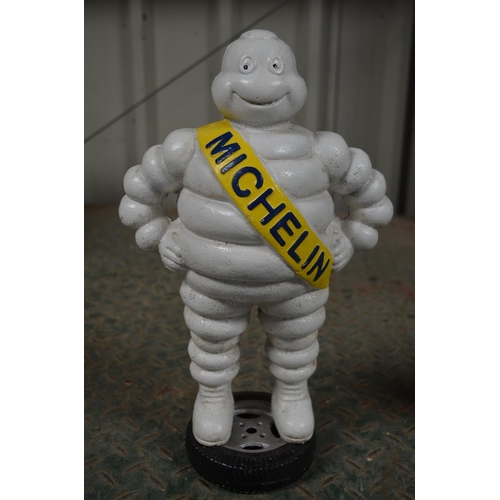 217 - Heavy cast metal Michelin Man figure, H39cm