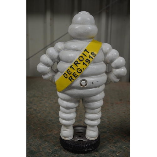 217 - Heavy cast metal Michelin Man figure, H39cm