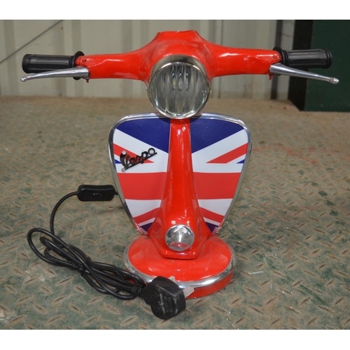 218 - Metal table top light in the form of a Vespa motor scooter front end, tested and in working order. H... 