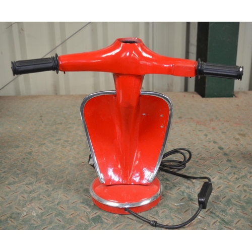 218 - Metal table top light in the form of a Vespa motor scooter front end, tested and in working order. H... 