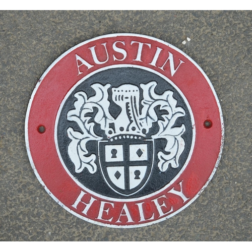 222 - Cast iron wall hanging Austin Healey relief plaque, D23.8cm