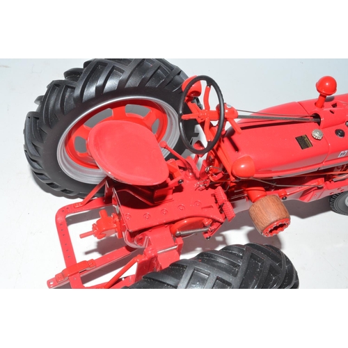 243 - Large Franklin Mint 1/12 scale die-cast McCormick Farmall Model H Tractor, with working steering, re... 