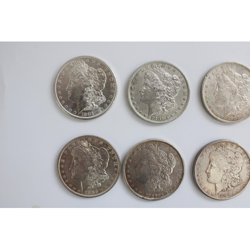 639 - Eight US silver Morgan dollars, dates 1881 (2), 1883, 1884, 1886, 1889, 1890 and 1921