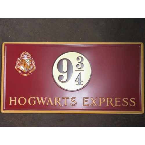 244 - Replica 'MG Safety Fast' metal wall sign and a Hogwarts Express 9 3/4 metal platform sign, 60cm x 30... 