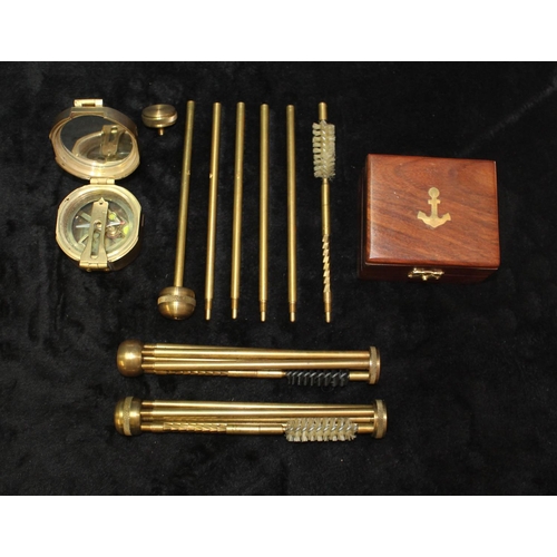 1102 - Three unusual individually numbered brass .410 gun cleaning rods, and a reproduction brass nautical ... 