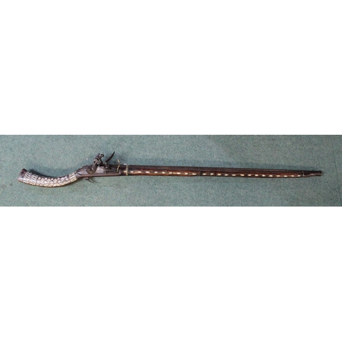 1103 - Early C20th Indo/Persian flint lock musket, with inlaid bone geometric pattern, with rod, L132cm