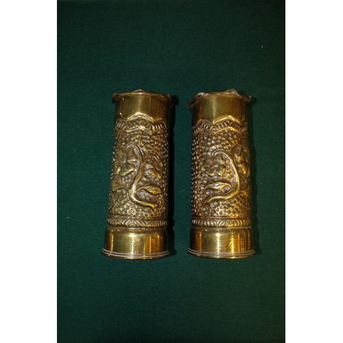 921 - Trench art shell case Spill Vases with dog decoration, and a pair of French military field glasses b... 