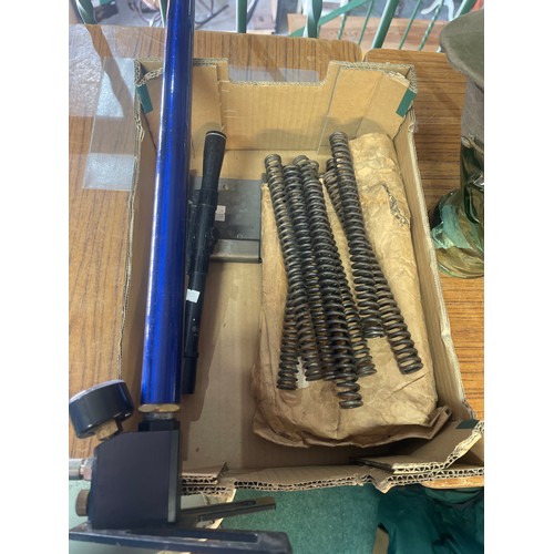 1110 - Collection of air-rifle springs, a BSA target pellet catcher, BSA scope (4x20), and a Webley hand pu... 