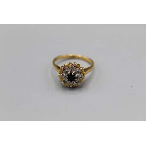 18ct yellow gold sapphire and diamond cluster ring, stamped 18, size P, 4.9g
