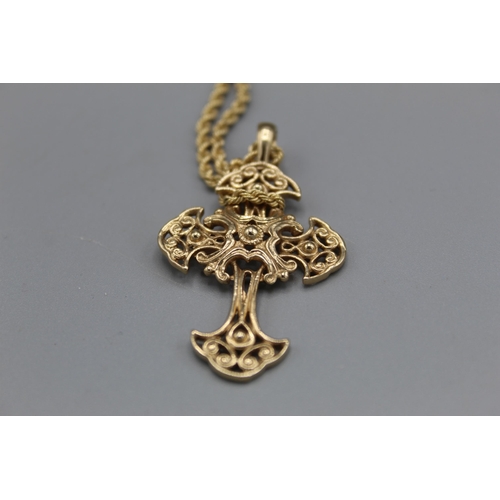 767 - 9ct yellow gold ornate cross pendant on 9ct yellow gold rope twist chain, L62cm, both stamped 375, 8... 