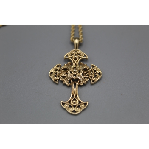 767 - 9ct yellow gold ornate cross pendant on 9ct yellow gold rope twist chain, L62cm, both stamped 375, 8... 