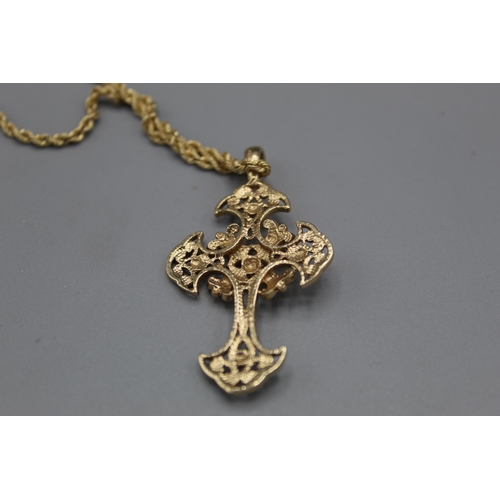 767 - 9ct yellow gold ornate cross pendant on 9ct yellow gold rope twist chain, L62cm, both stamped 375, 8... 