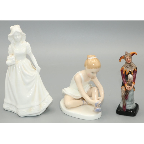 651 - Royal Doulton figures: The Jester HN3335 H9.5cm, Ballet Shoes HN3434 H9.5cm, and a figure of a lady ... 