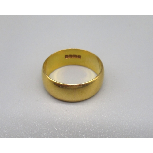 763 - 22ct yellow gold wedding band, stamped 22, size N1/2, 6.7g