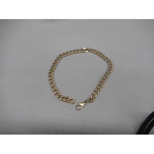 786 - 9ct yellow gold curb link bracelet, stamped 375, the clasp stamped 9k, L22cm, 14.1g