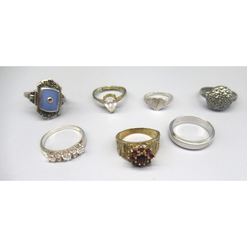 792 - Seven silver and silver gilt rings set with various stones, gross 0.73ozt