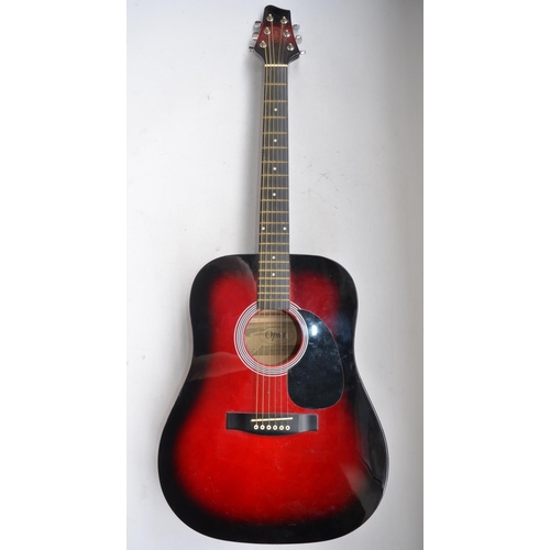 61 - Two full size acoustic guitars, an Opus Model SW201RDS with canvas case and strap and a Laramie By R... 