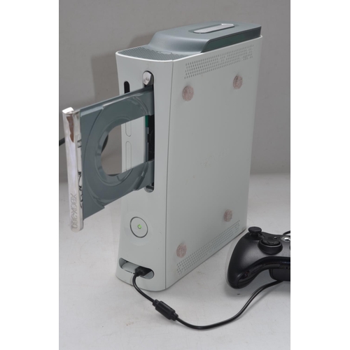 66 - White Xbox 360, 60GB hard drive with 1x controller, Microsoft wireless networking adapter, scart and... 