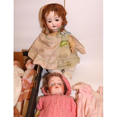 141 - Bisque and composition dolls and doll parts (2 boxes)