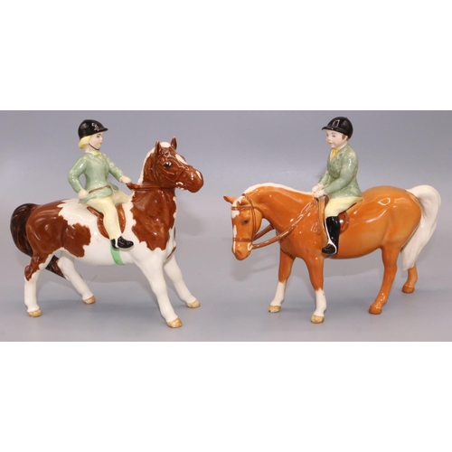 71 - Beswick figures: boy on palomino pony No. 1500, and a girl on a skewbald pony No. 1499, max. H14.5cm... 