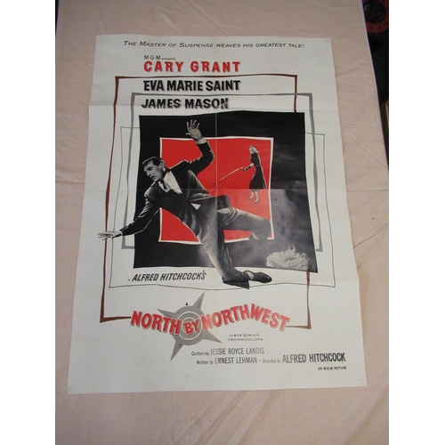 428 - North by Northwest movie poster, five 1980's reprints of 1930's railway posters, and four automotive... 