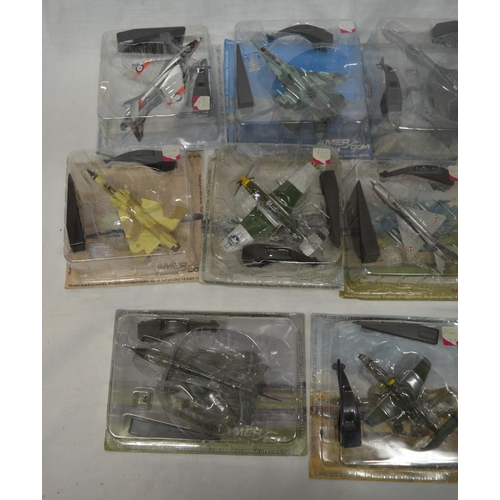 430 - Twenty pre-built plastic model aircrafts by Amer, with stands, all still sealed in boxes (20)