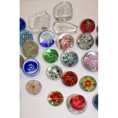 122 - Large collection of glass paperweights, including Mats Jonasson (2 boxes)