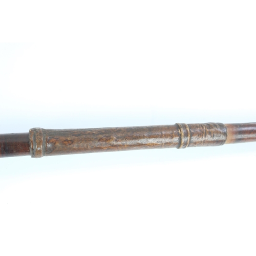 177 - African hardwood knobkerrie, globular head set with metal studs, H72cm