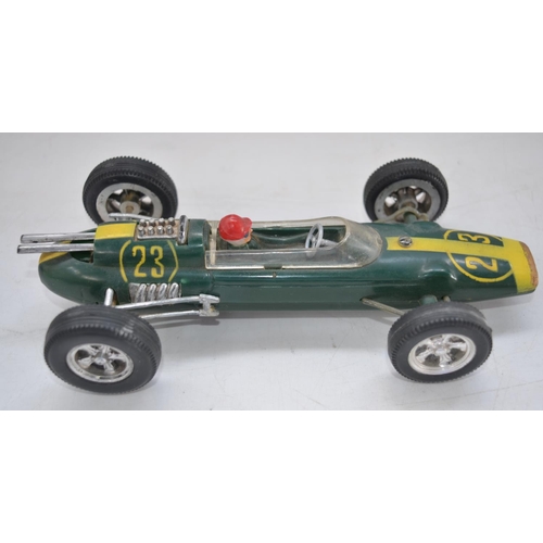 507 - Three vintage plastic race car models to include a Formula 1 Lotus friction powered race car No23 by... 