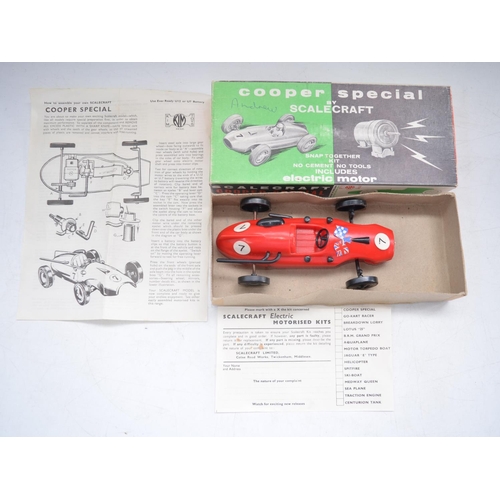 507 - Three vintage plastic race car models to include a Formula 1 Lotus friction powered race car No23 by... 