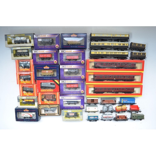 518 - Collection of mostly boxed OO gauge railway wagons and passenger coaches incl. Hornby, Dapol, Bachma... 