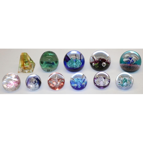 398 - Eight Caithness glass paperweights: Weathervane, Floral Illusion, Mini Moonflower x4, Mooncrystal, y... 