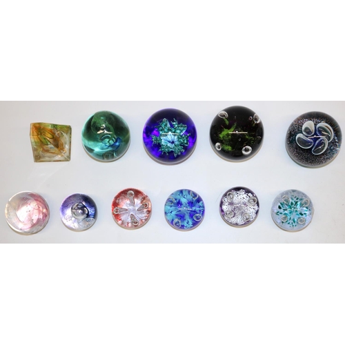 398 - Eight Caithness glass paperweights: Weathervane, Floral Illusion, Mini Moonflower x4, Mooncrystal, y... 