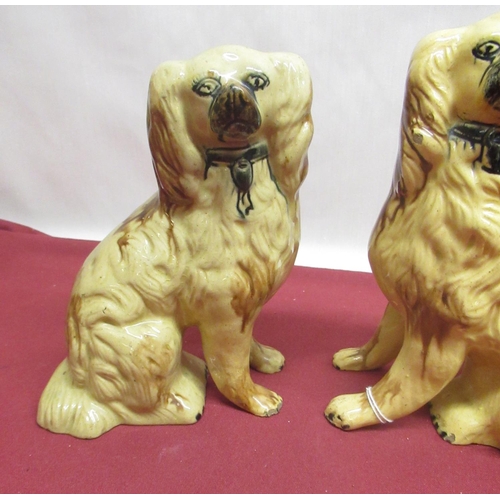 368 - Pair of C19th Staffordshire brown glazed hollow models of Spaniels with black muzzles and collars, H... 