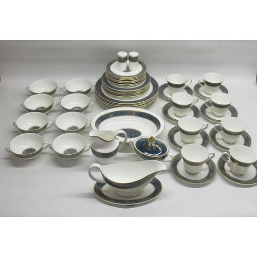 318 - Royal Doulton Carlyle pattern tea and dinner wares to include. cups and saucers, milk jug, side plat... 