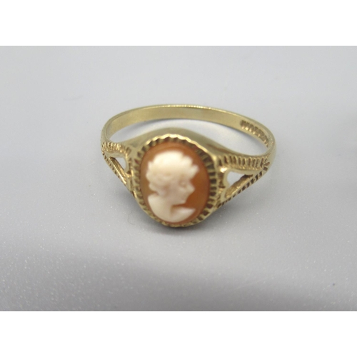 23 - 9ct yellow gold cameo ring, size L, a 9ct gold ring set with cabochon oval, size J1/2,  and a 9ct go... 