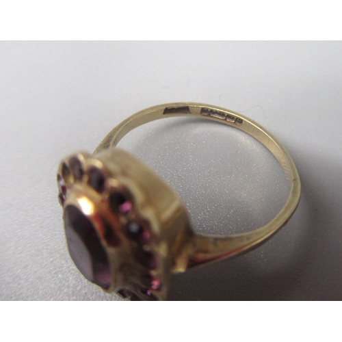 24 - 9ct yellow gold cluster ring set with purple stones, size K, and another 9ct gold ring set with pale... 