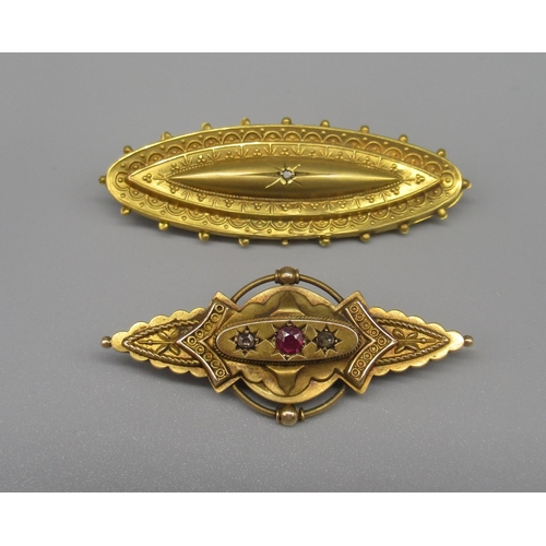 604 - Edwardian yellow gold ornate mourning brooch with clear back panel set with ruby and two diamonds in... 