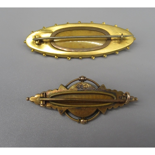 604 - Edwardian yellow gold ornate mourning brooch with clear back panel set with ruby and two diamonds in... 